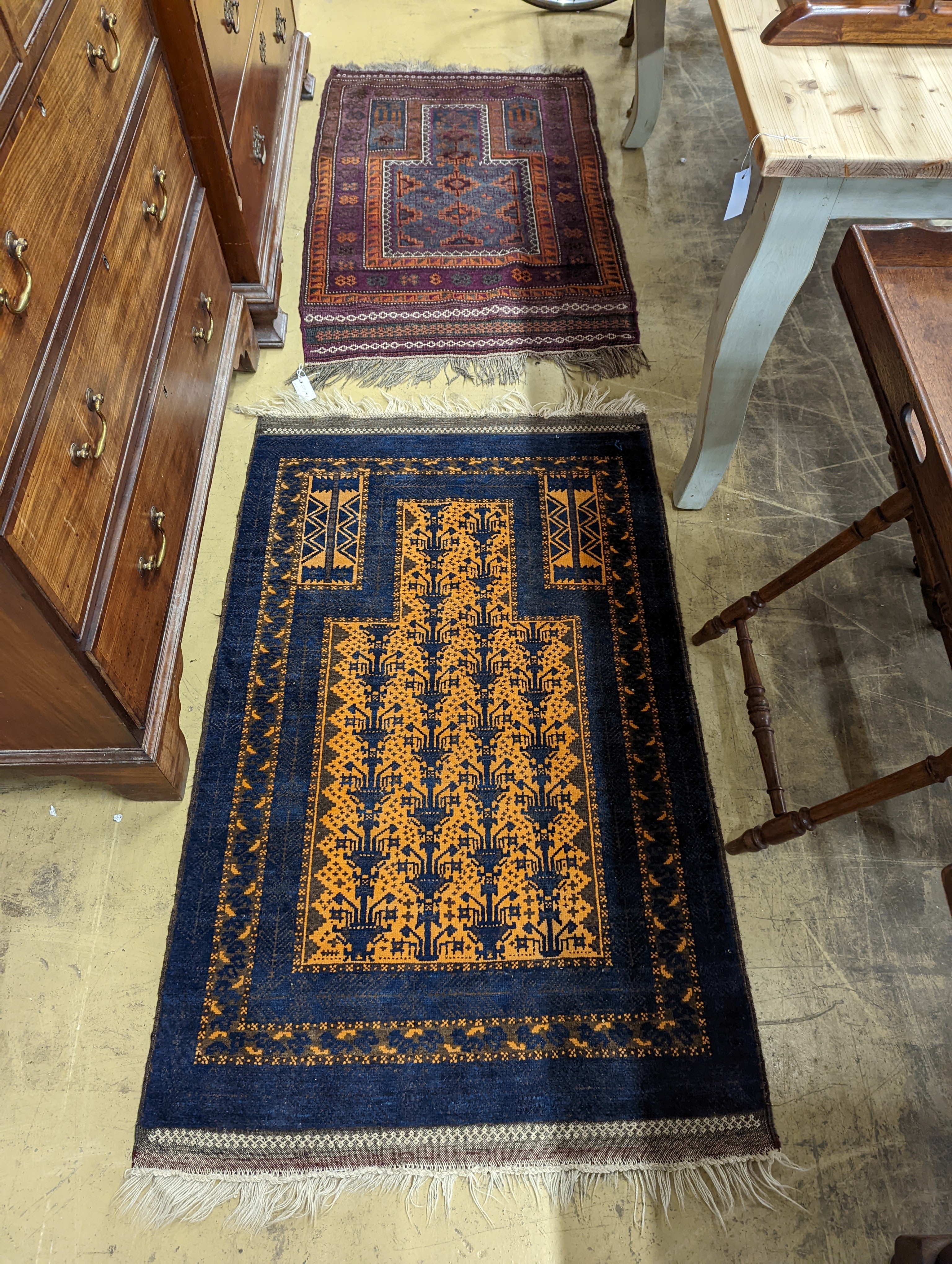 Two Belouch geometric prayer rugs, 106 x 57cm